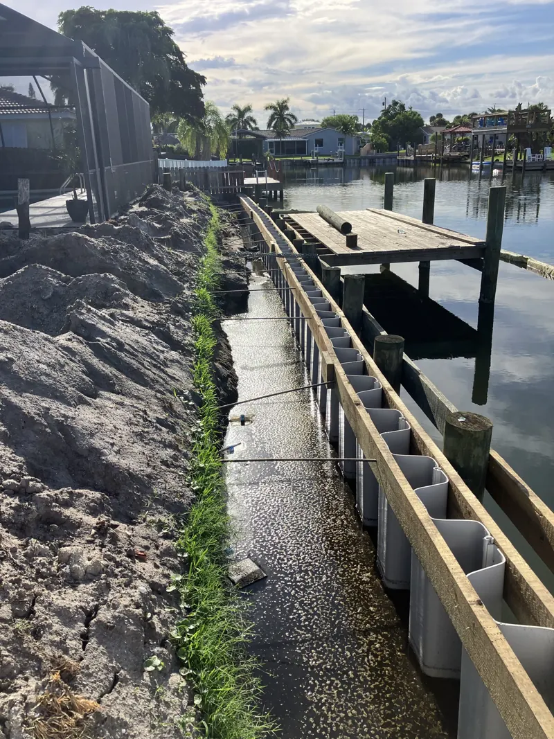 Vinyl sheet-pile seawall during installation